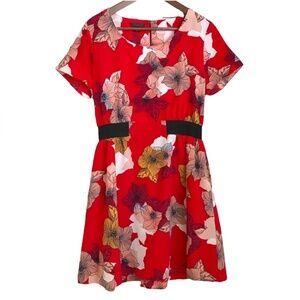 Floral red short sleeved dress, elastic waist. Black line drawing flowers flirty
